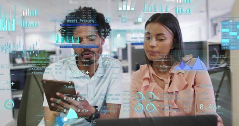 Two colleagues analyzing financial dashboard with charts, graphs and interactive metrics