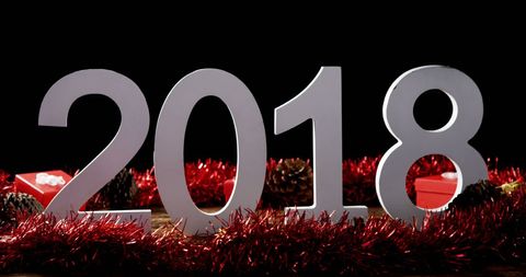 2018 New Year Decoration with Red Tinsel and Gifts