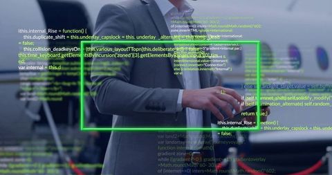 Executive verifying flight data using augmented reality interface at private jet ramp