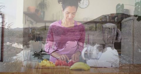 Woman preparing fresh fruits in modern kitchen for healthy lifestyle
