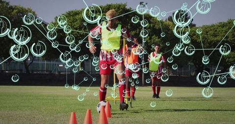 Young Athlete with Digital Overlay Dribbling Soccer Conditions in Training