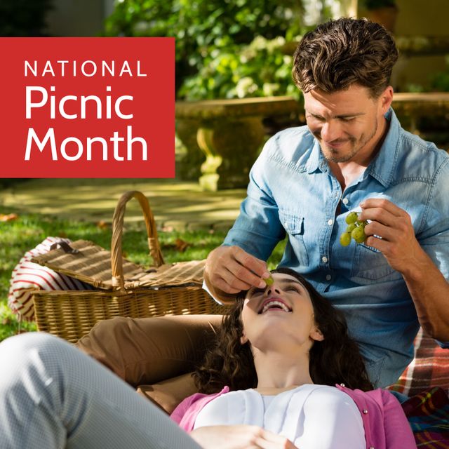 Caucasian Couple Enjoying Picnic with Grapes During National Picnic Month - Download Free Stock Templates Pikwizard.com