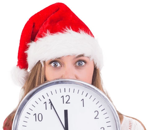 cheerful woman in santa hat holding transparent wall clock - Download Free Stock Videos Pikwizard.com