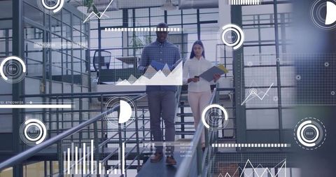 Corporate Professionals Analyzing Digital Data in Modern Office