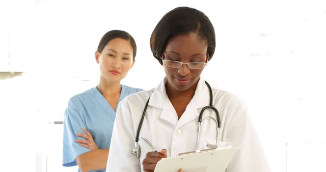 Confident Female Doctors in Medical Environment - Download Free Stock Images Pikwizard.com