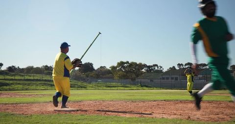 Baseball Infielder Preparing Throw on Sunlit Community Field During Game
