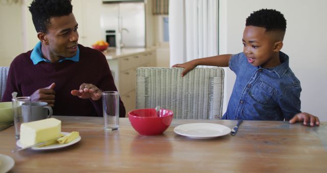 Father and Son Bonding During Breakfast at Home - Download Free Stock Images Pikwizard.com