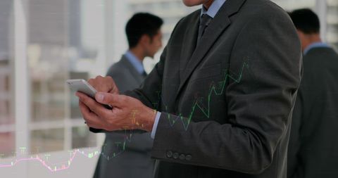 Businessman Analyzing Financial Data on Smartphone with Rising Charts