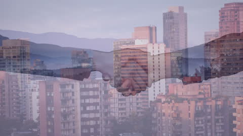 Handshake Overlaying Urban Skyline Symbolizing Global Connections