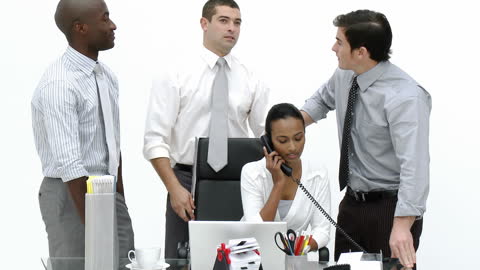 Diverse Team Collaboration Around Conference Table