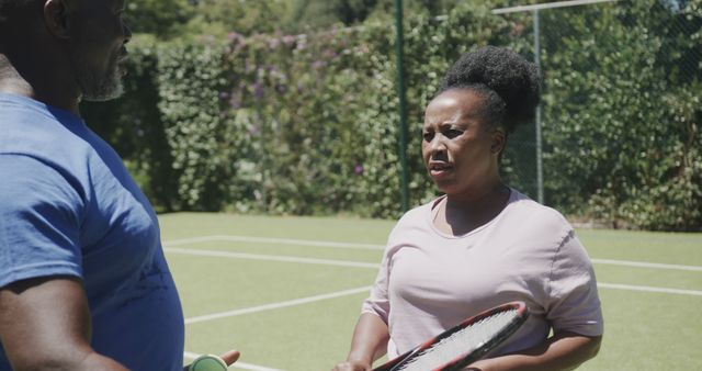 Senior Couple Playing Tennis and Enjoying Outdoor Activity - Download Free Stock Images Pikwizard.com