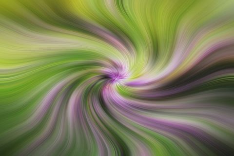 Abstract green swirl pattern with vortex effect