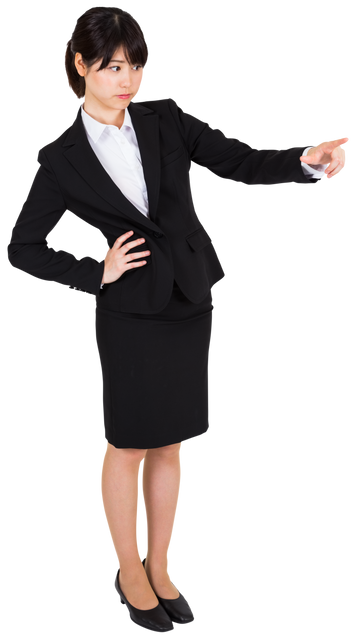 Focused Asian Businesswoman in Formal Suit Pointing - Download Free Stock Videos Pikwizard.com