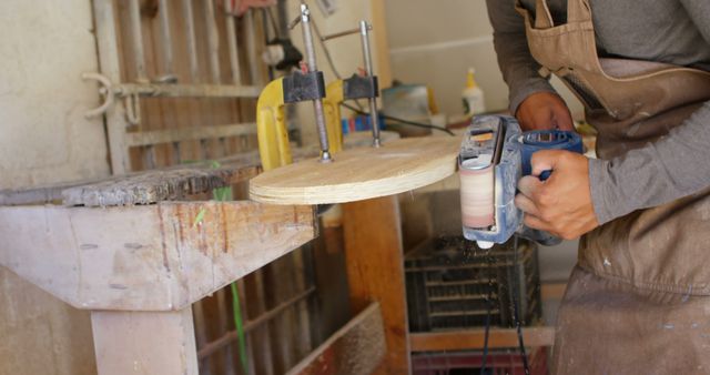 Craftsman Working with Electric Sander in Woodwork Shop - Download Free Stock Images Pikwizard.com