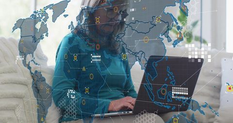 Global data analytics concept with woman using laptop