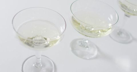 Elegant Crystal Champagne Glasses on White Background