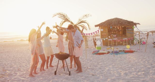 Friends Celebrating Beach Barbecue at Sunset - Download Free Stock Images Pikwizard.com