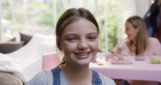 Smiling Girl in Casual Outfit Enjoying Breakfast at Home - Download Free Stock Images Pikwizard.com