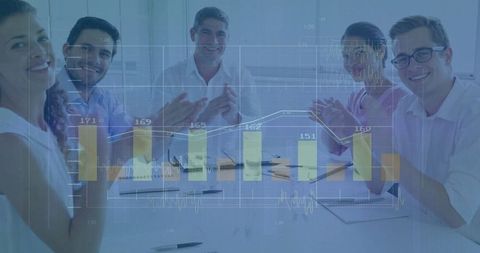 Business team applauding successful meeting with analytics overlay