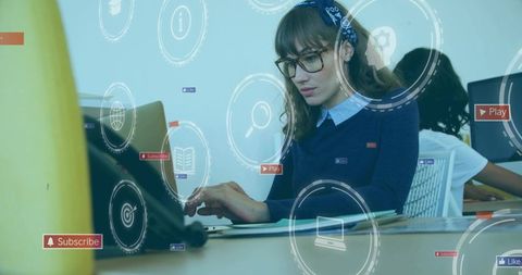 Working woman typing on laptop with digital hud icons for online learning and coworking