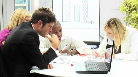 Young Diverse Team Collaborating on Business Project in Office