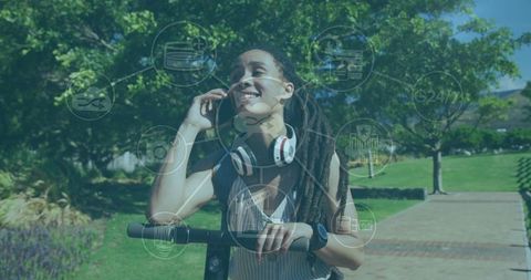 Woman Using Smartphone on Scooter with Digital Interface Icons