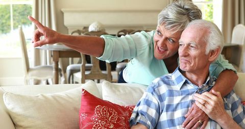Senior Couple Enjoying Quality Time in Living Room