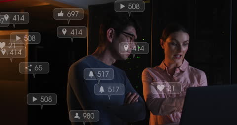 Tech Professionals Analyzing Digital Networks and Metrics