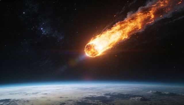 Fiery meteoroid plunging toward earth with blazing plasma tail over planetary horizon
