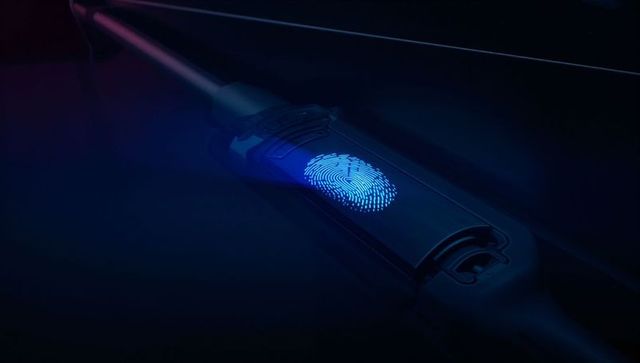 Neon lit biometric fingerprint scanner with futuristic aesthetic