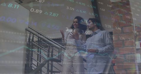 Diverse colleagues discussing financial market trends in modern office