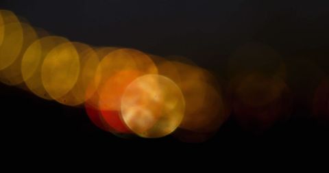 Abstract Yellow Light Bokeh on Dark Background - Download Free Stock Images Pikwizard.com