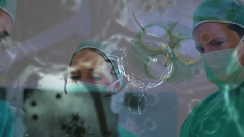 Surgeons in Operating Room Analyzing COVID-19 Data Visualizations