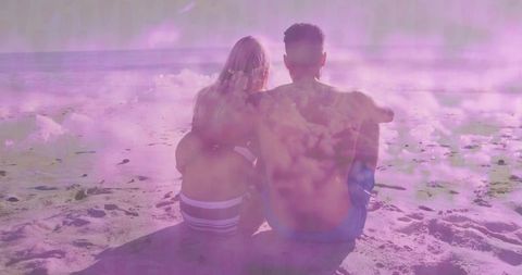 Romantic Couple Relaxes on Tranquil Beach