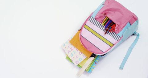 Colorful School Backpack with Books and Supplies - Download Free Stock Images Pikwizard.com