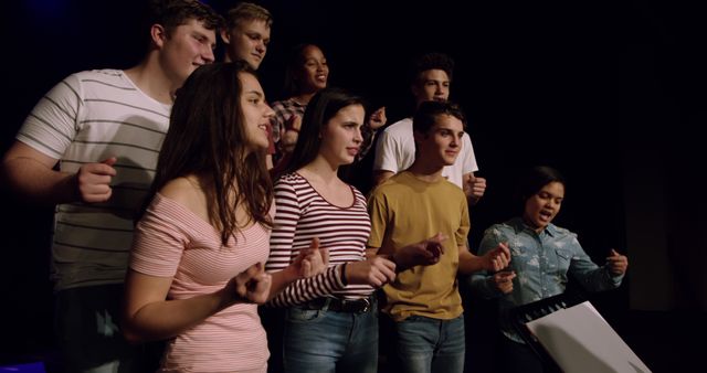 Group of Teenagers Singing Together on Stage - Download Free Stock Images Pikwizard.com