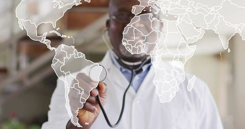 Global health check: senior physician holding stethoscope over digital world map