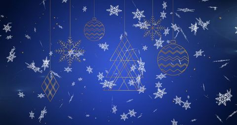 Festive Christmas Ornaments with Snow on Blue Background