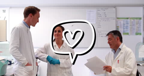 Team of Scientists Collaborating in Modern Lab Environment