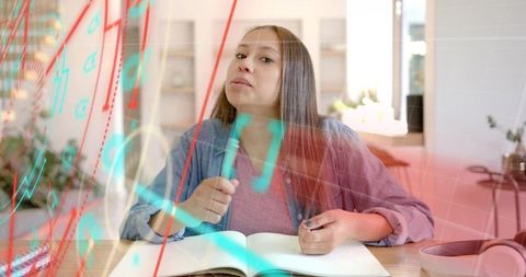 Teen Sketching on Transparent Glass Board with Teal Marker at Sunlit Home Study Desk