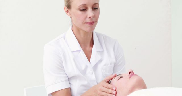 Professional Female Therapist Giving Relaxing Head Massage - Download Free Stock Images Pikwizard.com