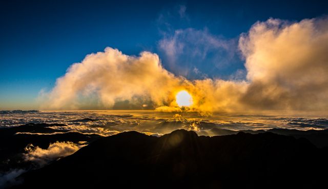 Majestic Sunrise Over Mountain Range with Cloud Cover - Download Free Stock Photos Pikwizard.com