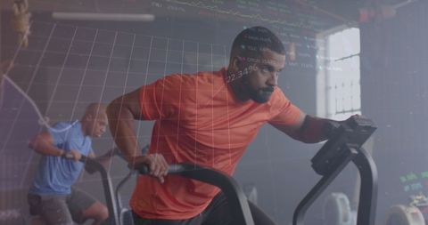 Man Engages in Intense Cross Training on Elliptical