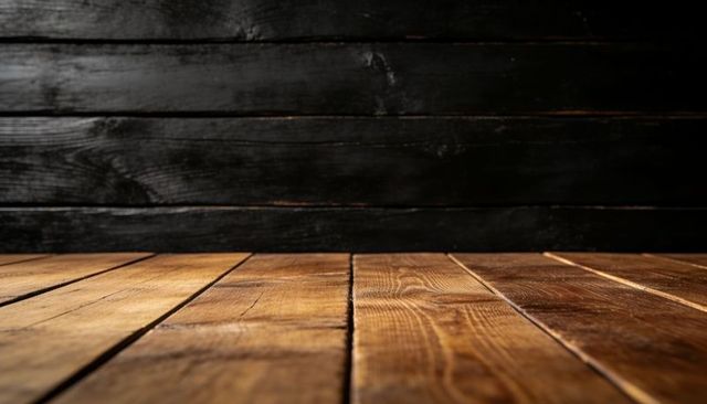 Rustic wooden planks leading to dark timber wall, warm grain texture and moody light