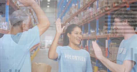 Volunteers Celebrating Success in Warehouse with Digital Overlay