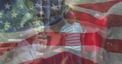 African american family in park with u.s. Flag overlay