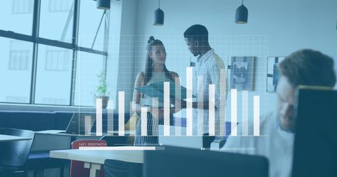 Coworkers Discussing Data Analysis in Modern Office Environment - Download Free Stock Images Pikwizard.com