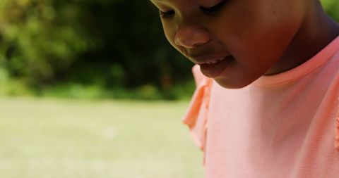 Child Engaged with Tablet in Sunny Park Setting - Download Free Stock Images Pikwizard.com