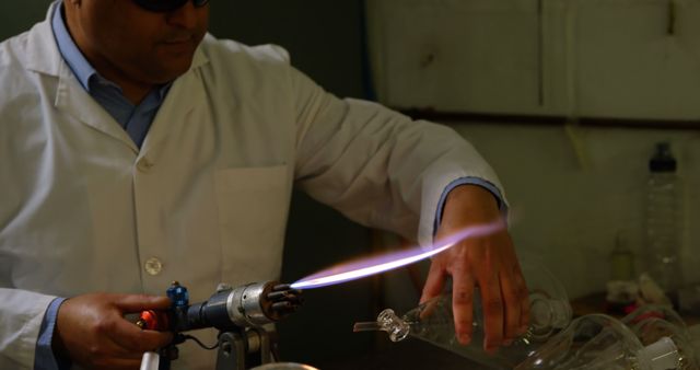 Skilled Craftsman Glassblowing with Precision and Focus - Download Free Stock Images Pikwizard.com