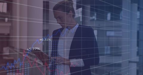 businesswoman analyzing financial data on tablet with graph overlay - Download Free Stock Images Pikwizard.com